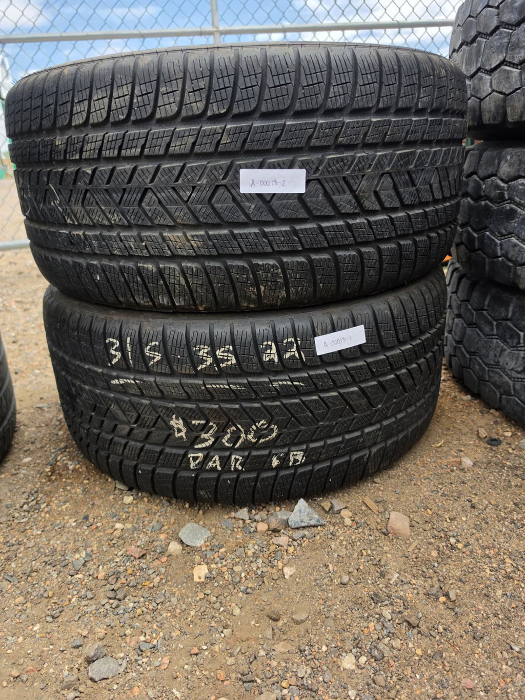 325/35R32 Pair (2 Used Tires)Pirelli Scorpion Snow Tires
