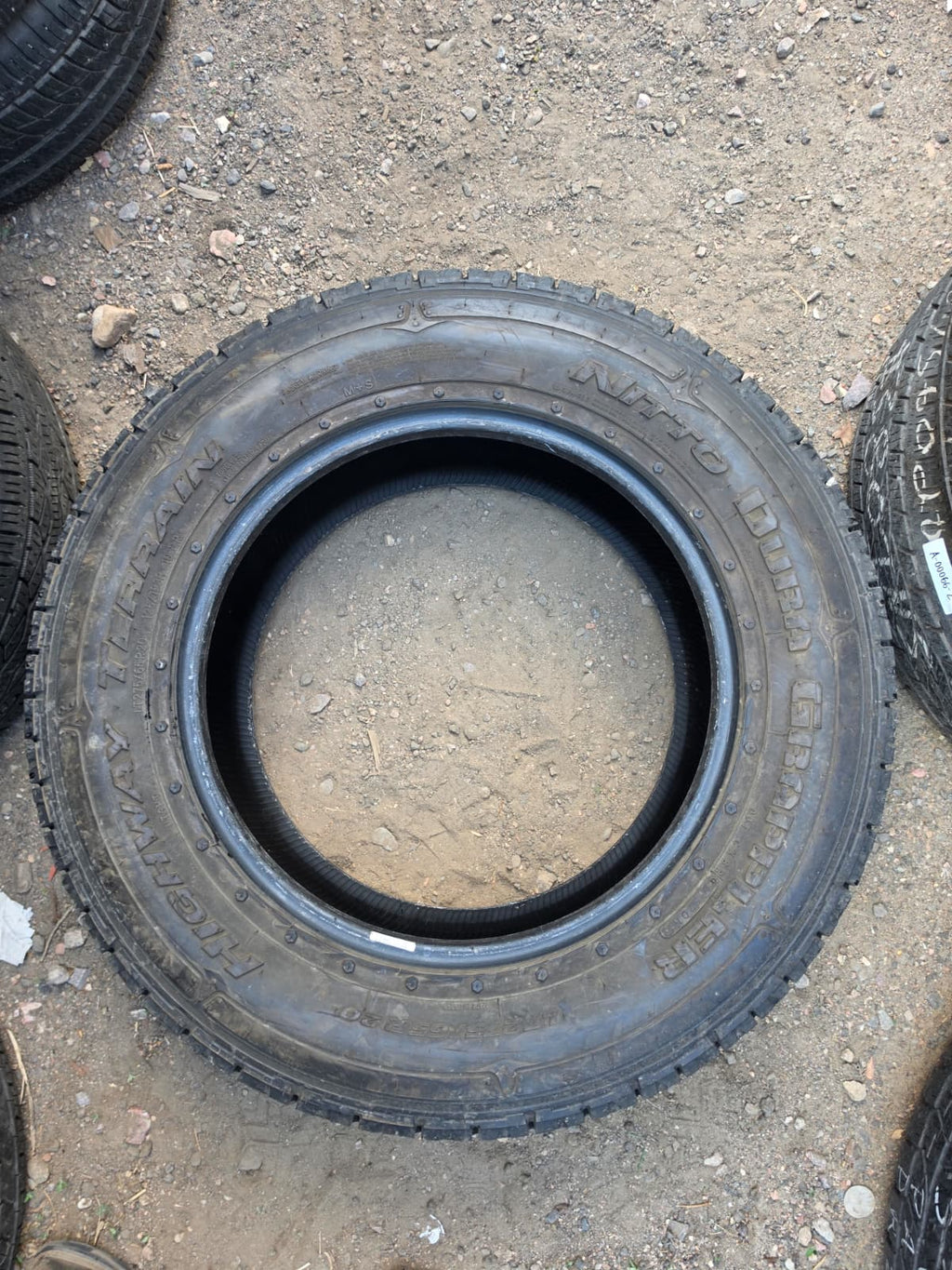 LT275/65R20 Set (4 Used Tires) Nitto Dura Grappler