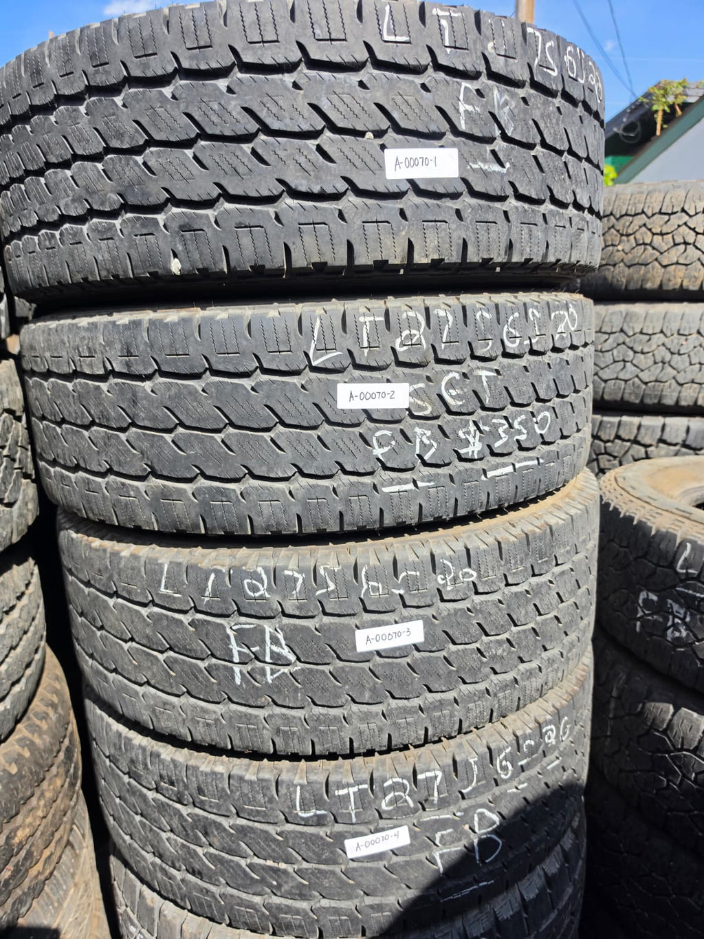 LT275/65R20 Set (4 Used Tires) Nitto Dura Grappler