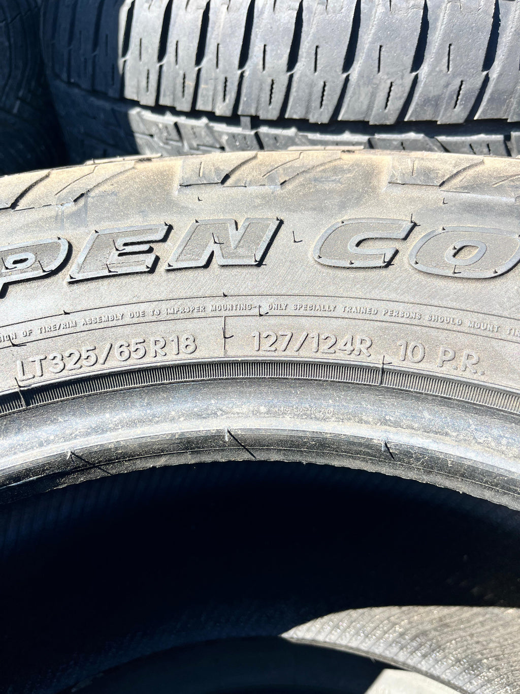 LT325/65R18 Set (4 Used Tires) Toyo Tires Open Country