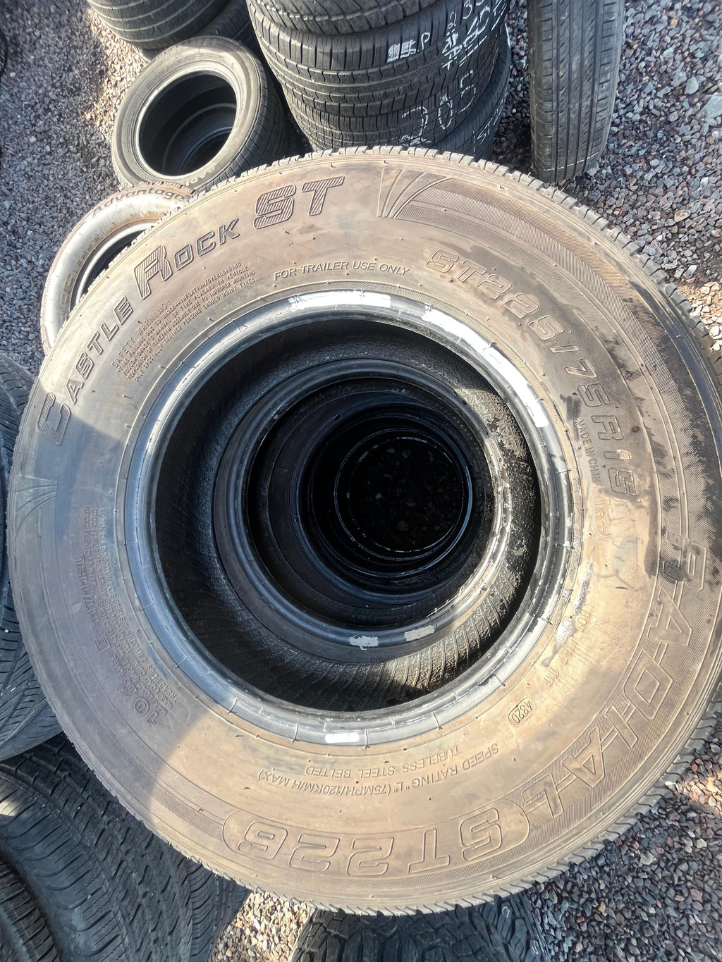 ST225/75R15 Single (1 Used Tire) Castle Rock Radial (ST226)