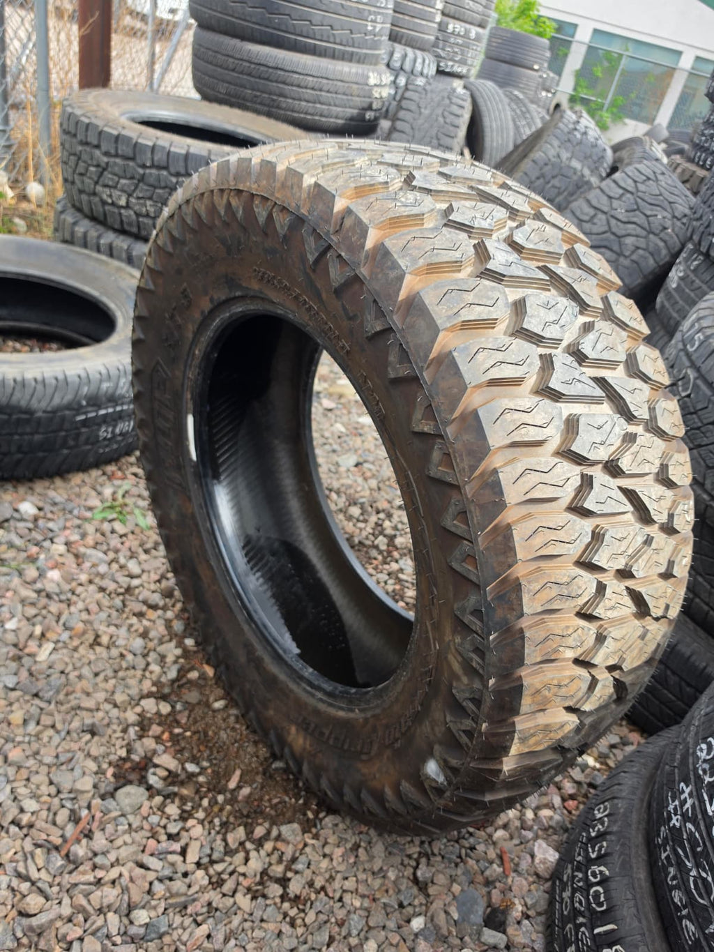 LT35X12.50R20 Single (1 Used Tire) AMP Terrain Gripper