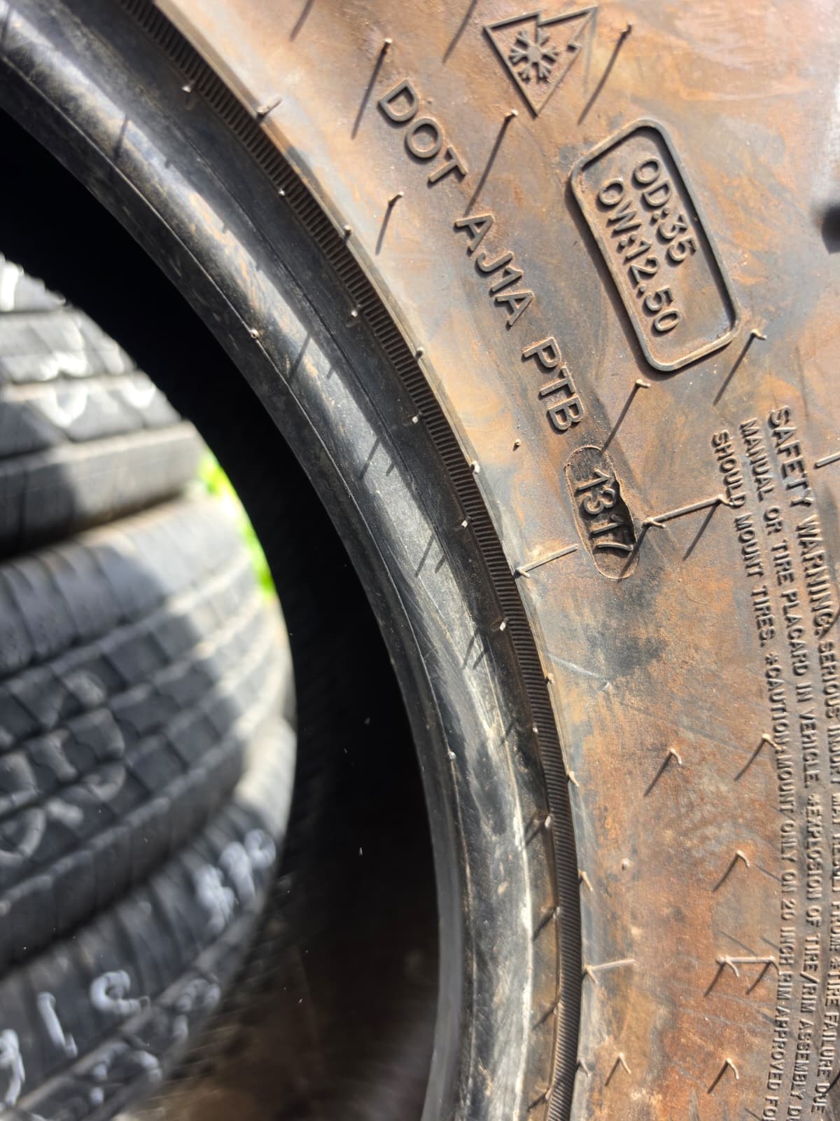 LT35X12.50R20 Single (1 Used Tire) AMP Terrain Gripper