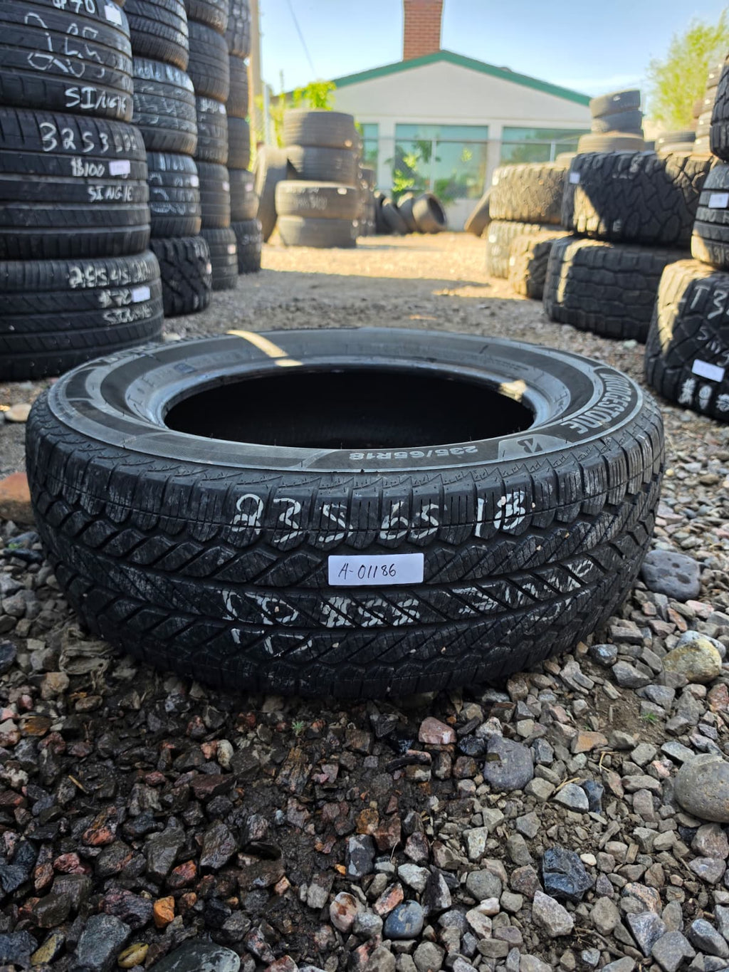 235/65R18 Single (1 Used Tire) Bridgestone Weather Peak