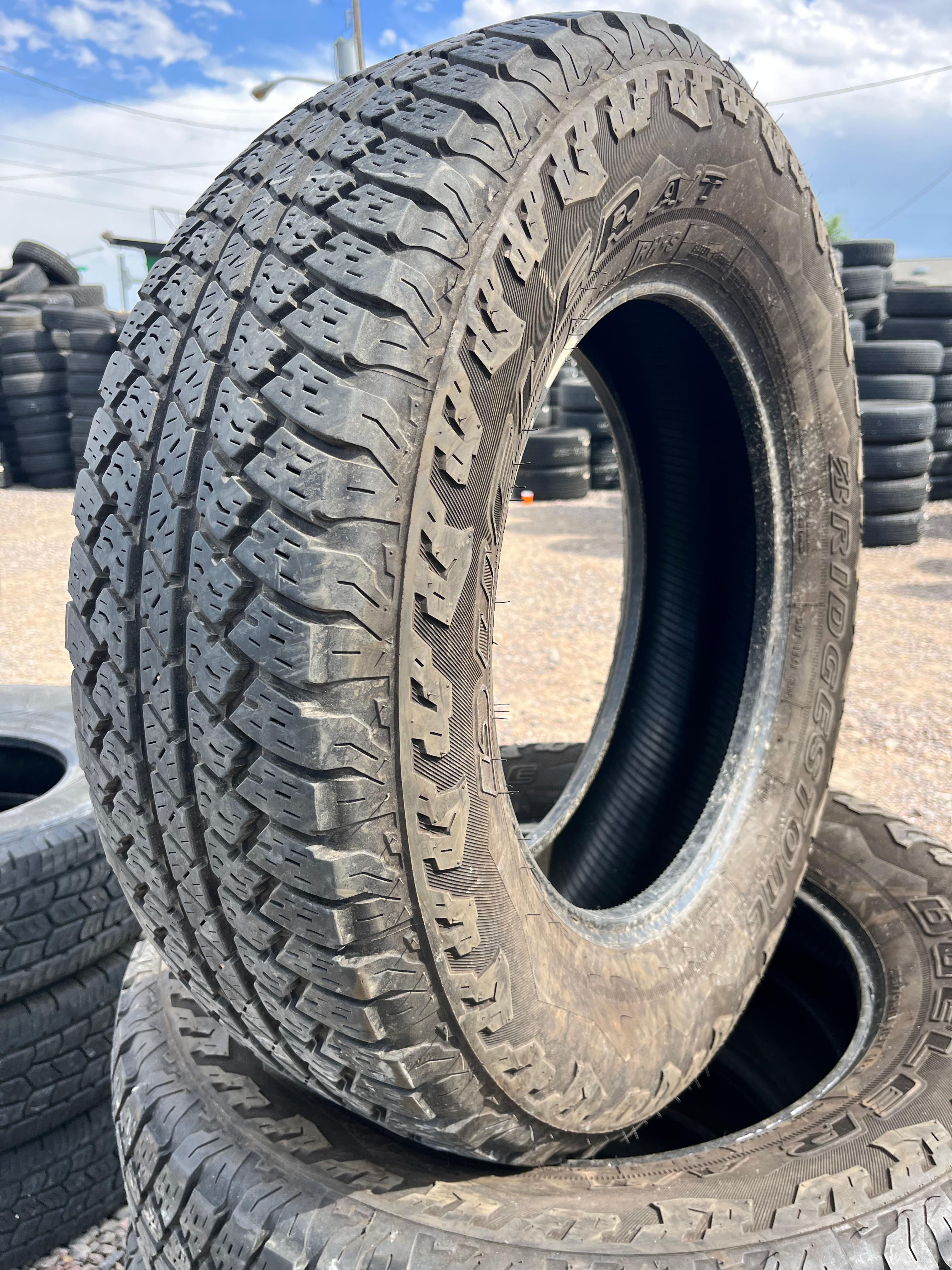 LT255/70R18 Set (4 Used Tires) Bridgestone Dueler
