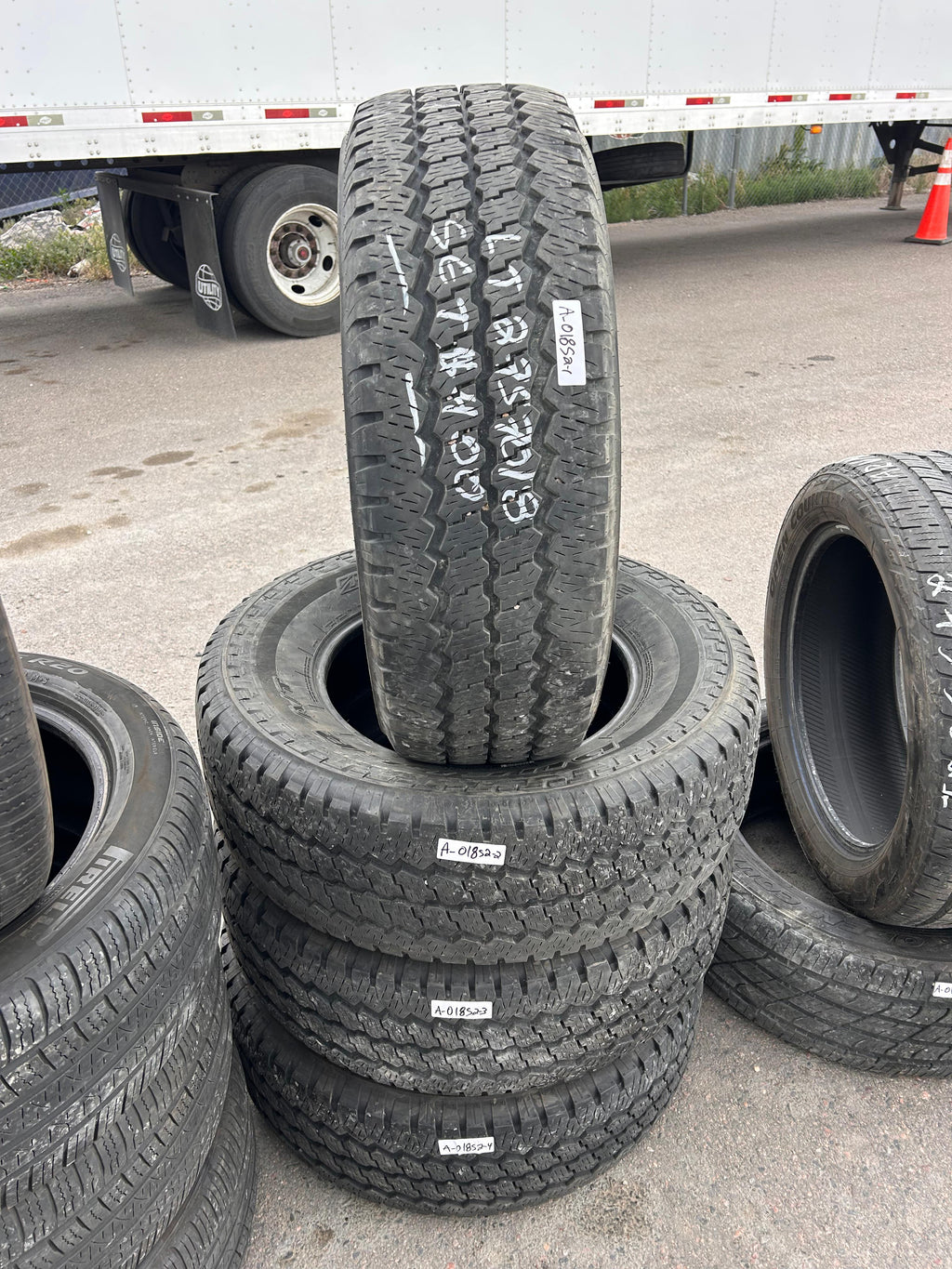 LT275/70R18 Set (4 Used Tires) Bridgestone Dueler A/T