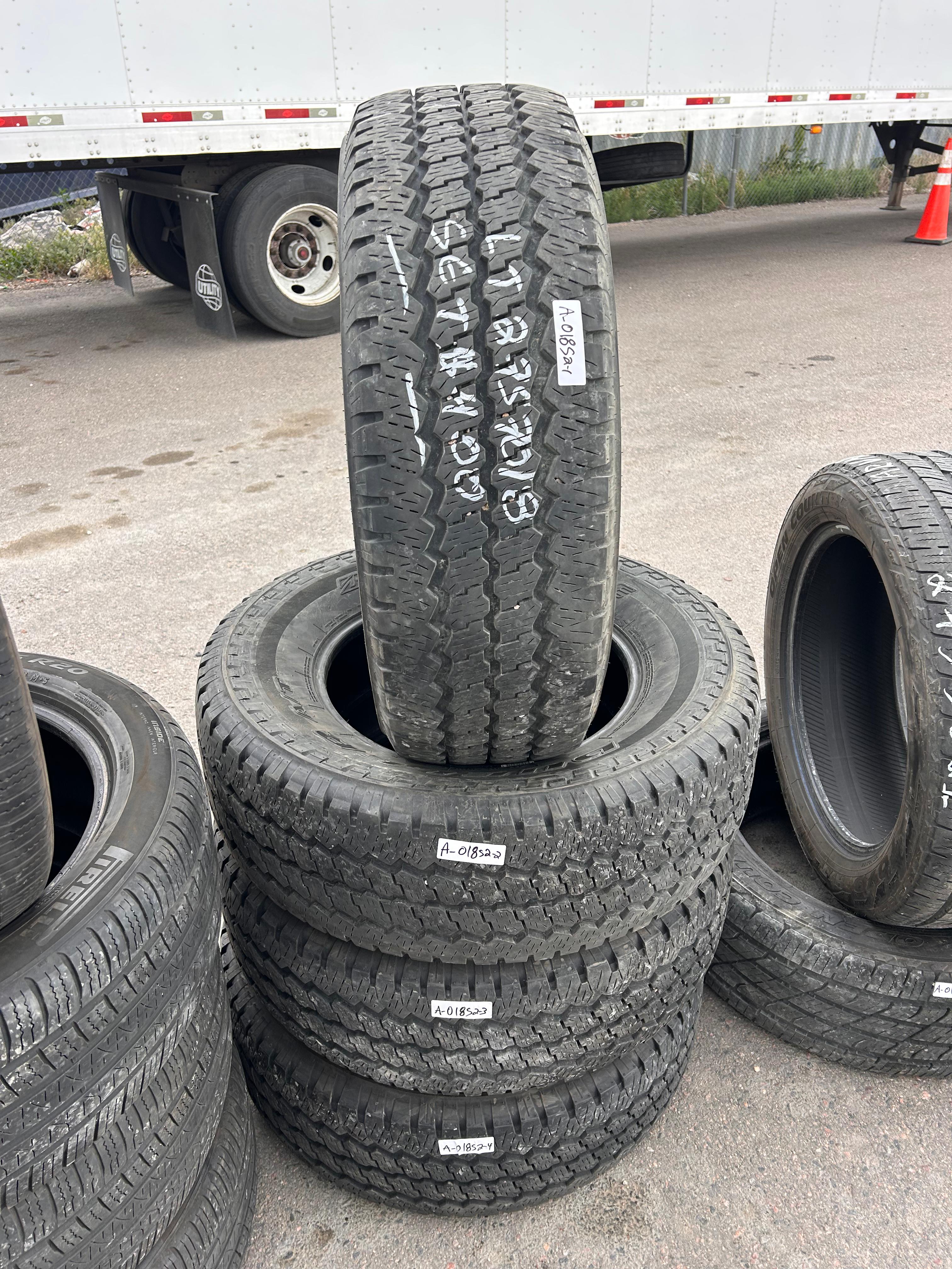 LT275/70R18 Set (4 Used Tires) Bridgestone Dueler A/T