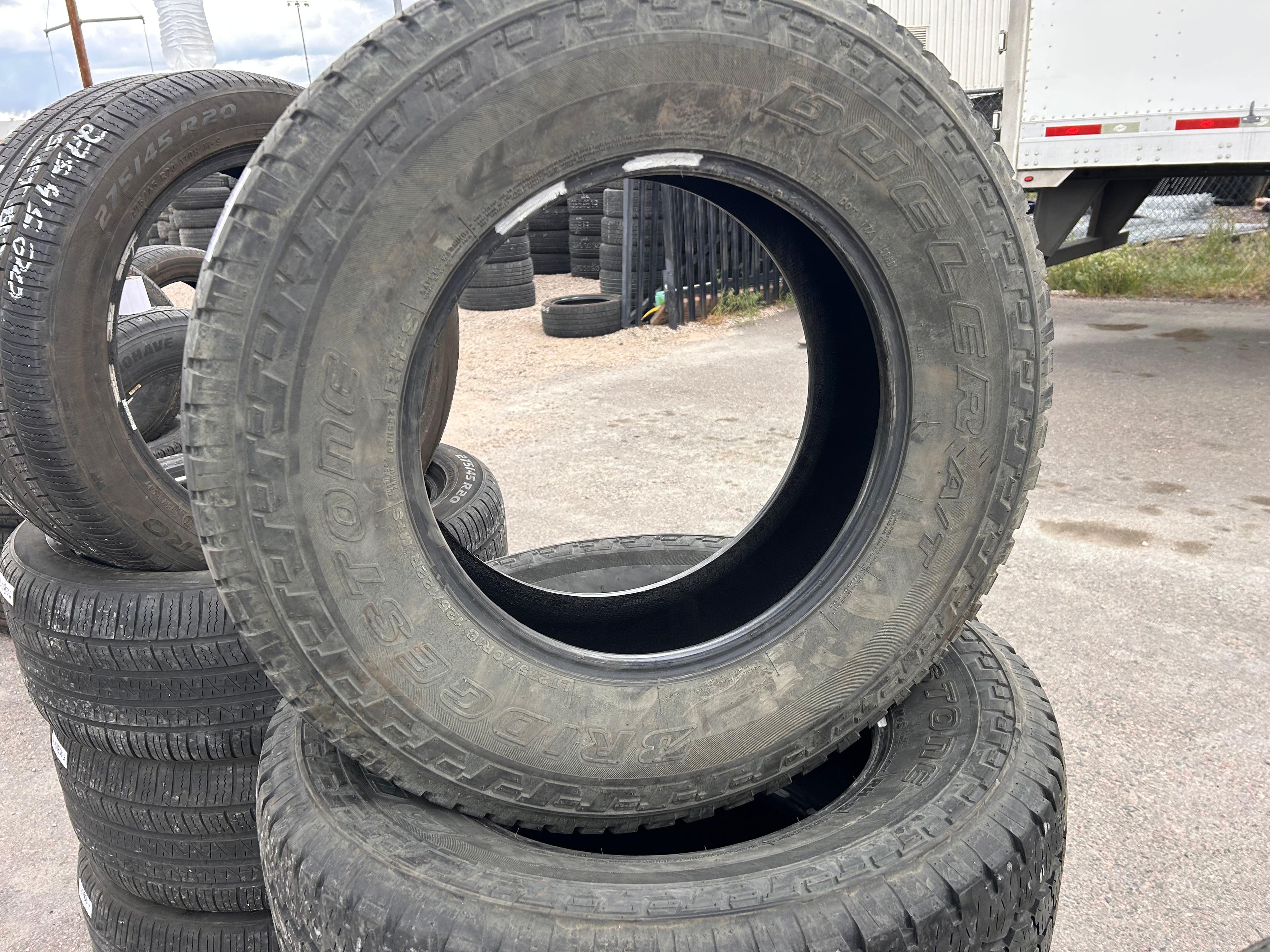 LT275/70R18 Set (4 Used Tires) Bridgestone Dueler A/T